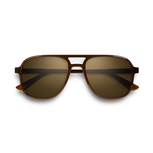 General front view of VALLON X Topo Designs sunglasses in "Brown / Brown" with sunglass arms closed.