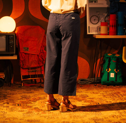 General lifestyle shot of Topo Designs Desert Wide Leg Pants - Women's in "Black"
