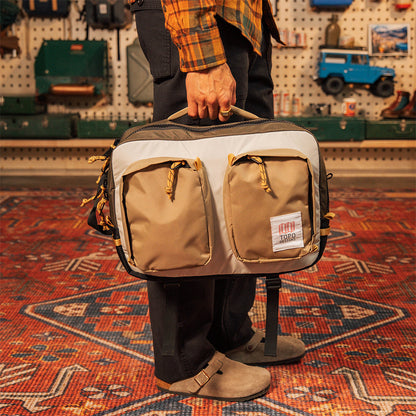 General shot of Global Briefcase being carried by side handle