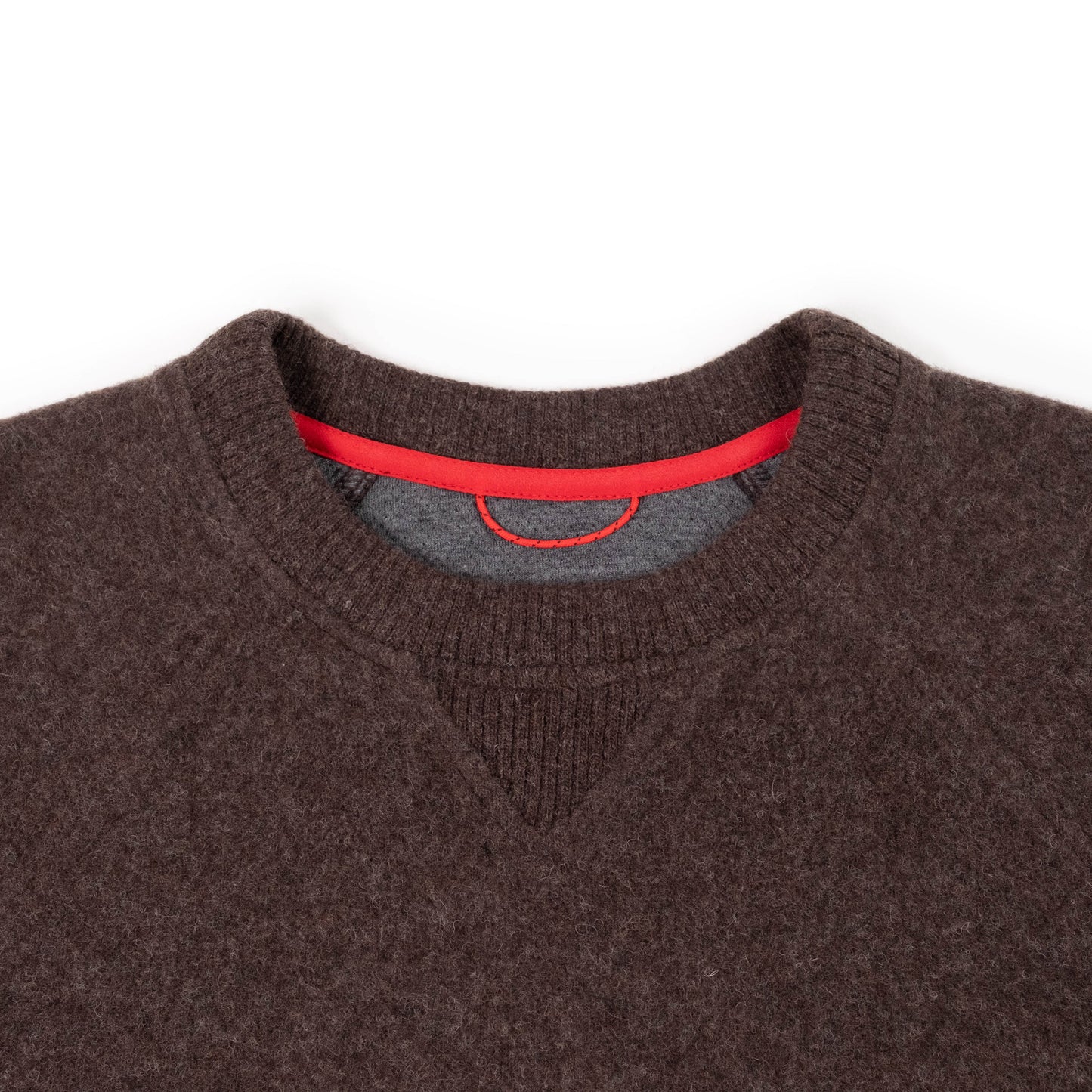 General Detail shot of Topo Designs Global Wool Sweater - Men's in "Chocolate"