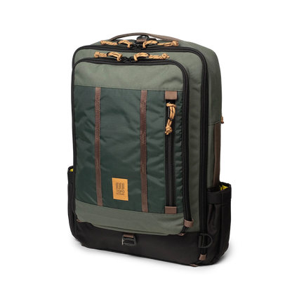 Topo Designs Global Travel Bag 30L Durable Carry On Convertible Laptop Travel Backpack in "Woodland / Forest".