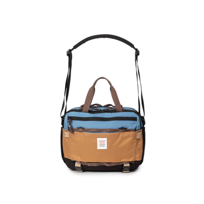 Front View of Topo Designs Mountain Cross Bag in "River Blue / Brown Oak"