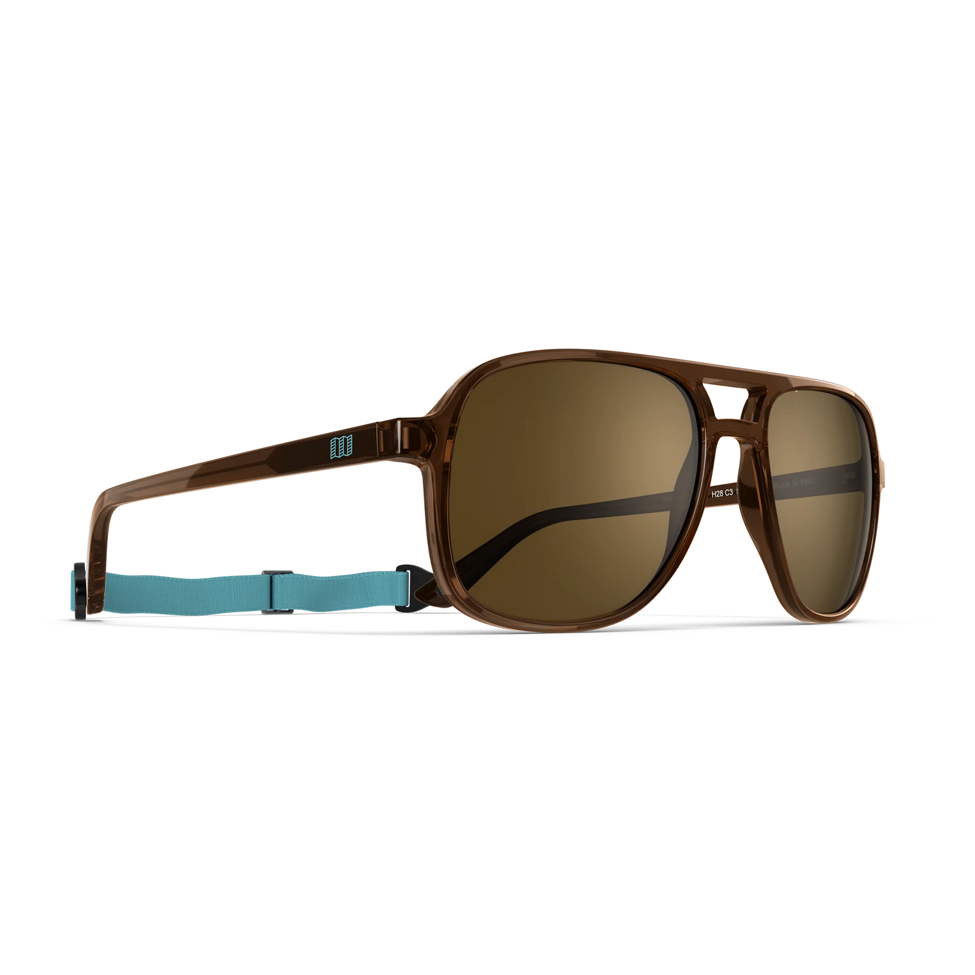 General alternate angled view of VALLON X Topo Designs sunglasses in "Brown / Brown" with sunglass arms open with strap attached.