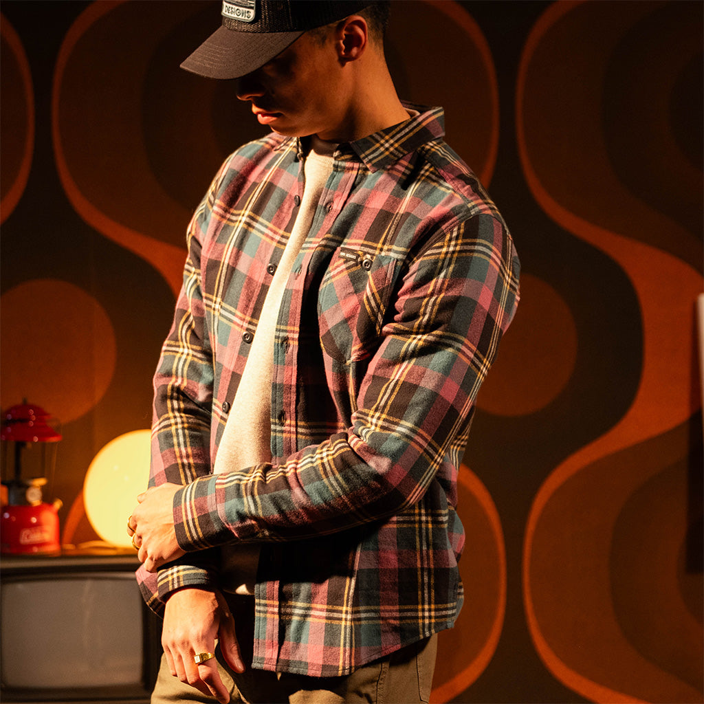 General shot of Person wearing a "Black / Goldenrod Multi" Mountain Shirt Lightweight with a dark background