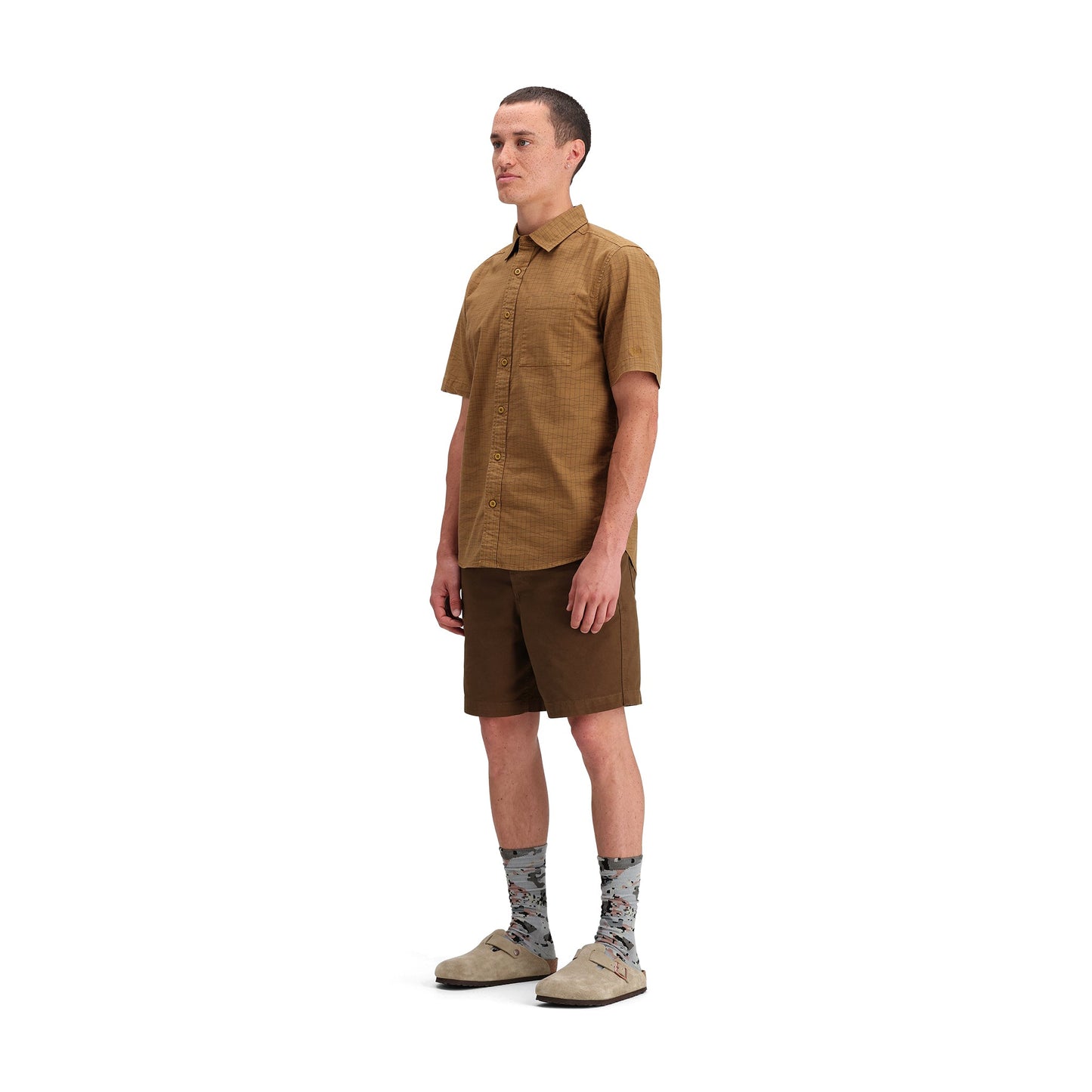 Side model shot of Topo Designs Dirt Desert Shirt Ss - Men's in "Dark Khaki Terrain"