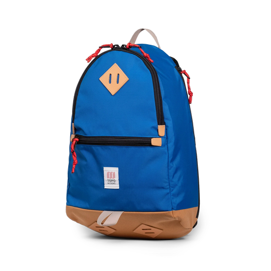 Quarter view of Topo Designs Classic Teardrop Backpack in "Classic Blue"