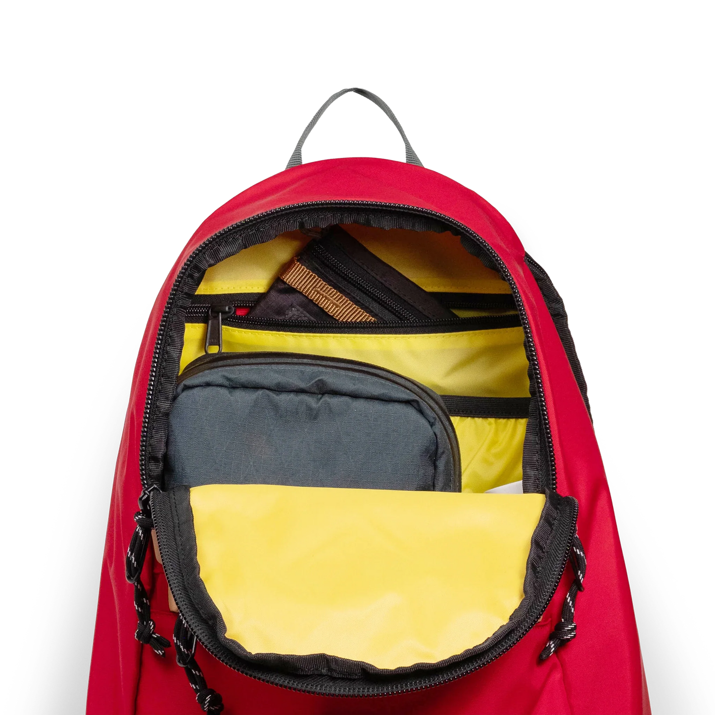 General detail view of Topo Designs Classic Teardrop Backpack in "Salsa" with the main compartment opened.