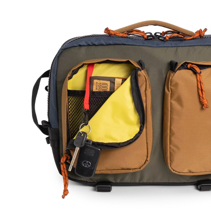 General full front product shot of the global briefcase showing use of the front zip pocket in "Olive / Dark Khaki".