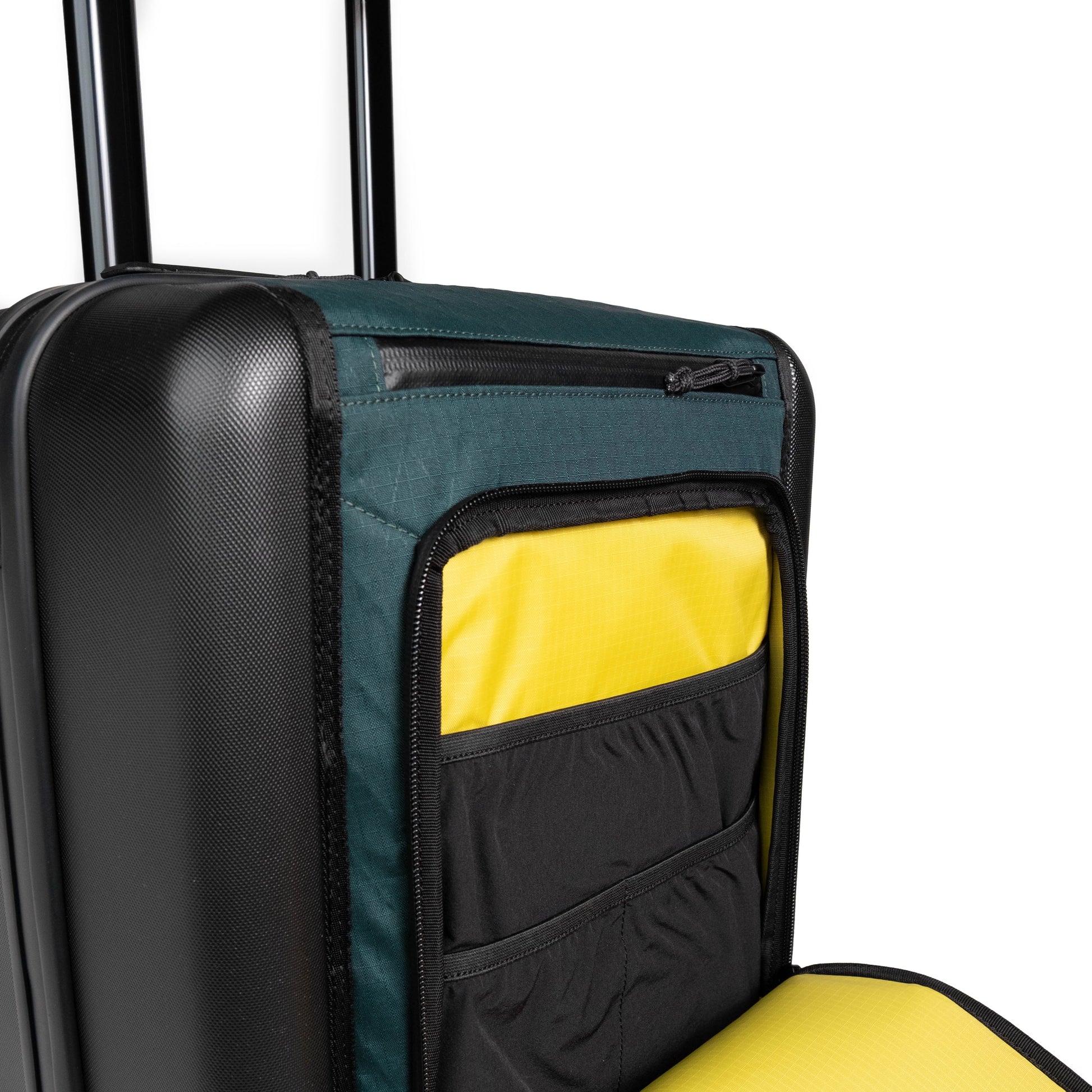 General detail shot of Topo Designs Global Pro Travel Roller Bag showing exterior zip pocket