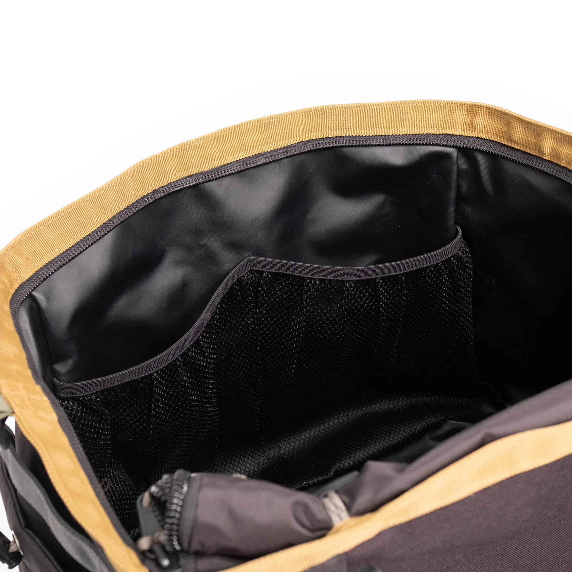 General detail shot of Topo Designs Mountain Gear Bag in "Black / Neutral" showing interior pockets.