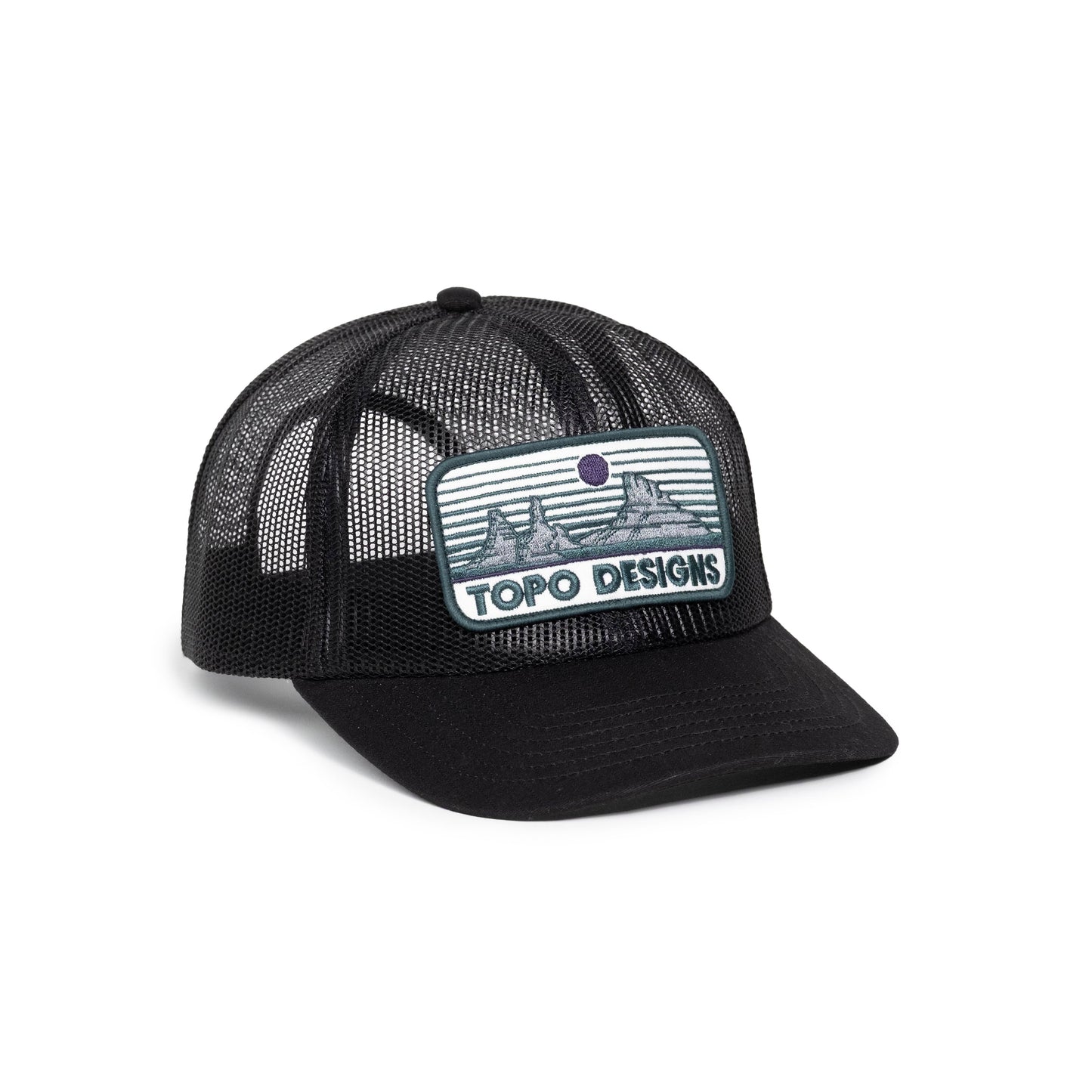 Front white background quarter image of Topo Designs Patch Mesh Trucker - Desert Dusk in "Black"