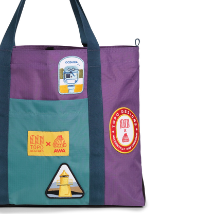 Front exterior detail image of Topo Designs x AWA Mountain Essential Tote in "Loganberry / Caribbean"
