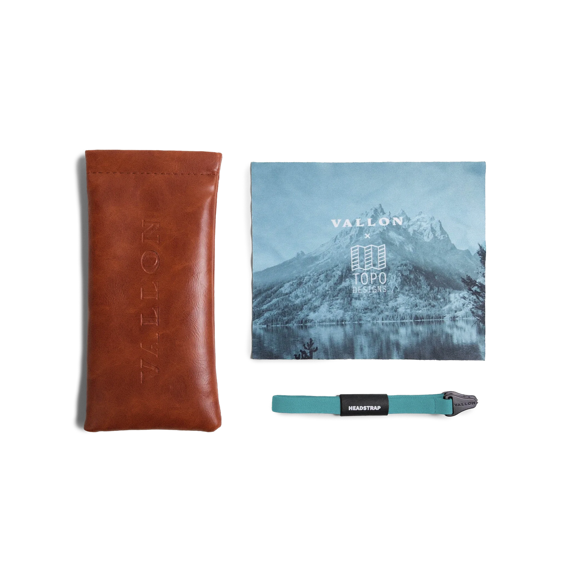 General view of VALLON X Topo Designs sunglasses accessories in "Brown / Brown" with microfiber cloth, leather sunglasses case, and sunglasses strap.