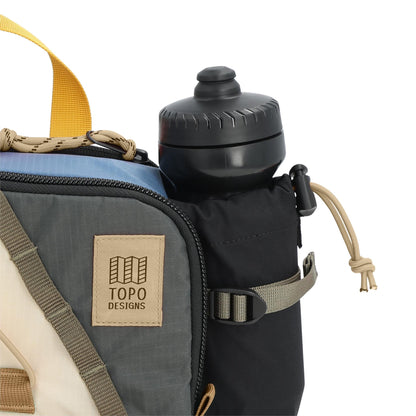General Detail shot of Topo Designs Mountain Hydro Hip Pack in "Stone Blue / Bone White"