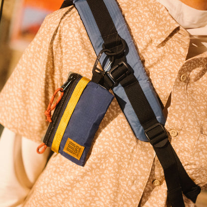 General lookbook image of Mountain Accessory Bag in "Beetle / Midnight"