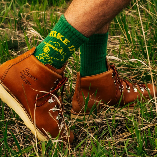General lifestyle image of Topo Designs x TSPTR Hike It Socks in "Green"